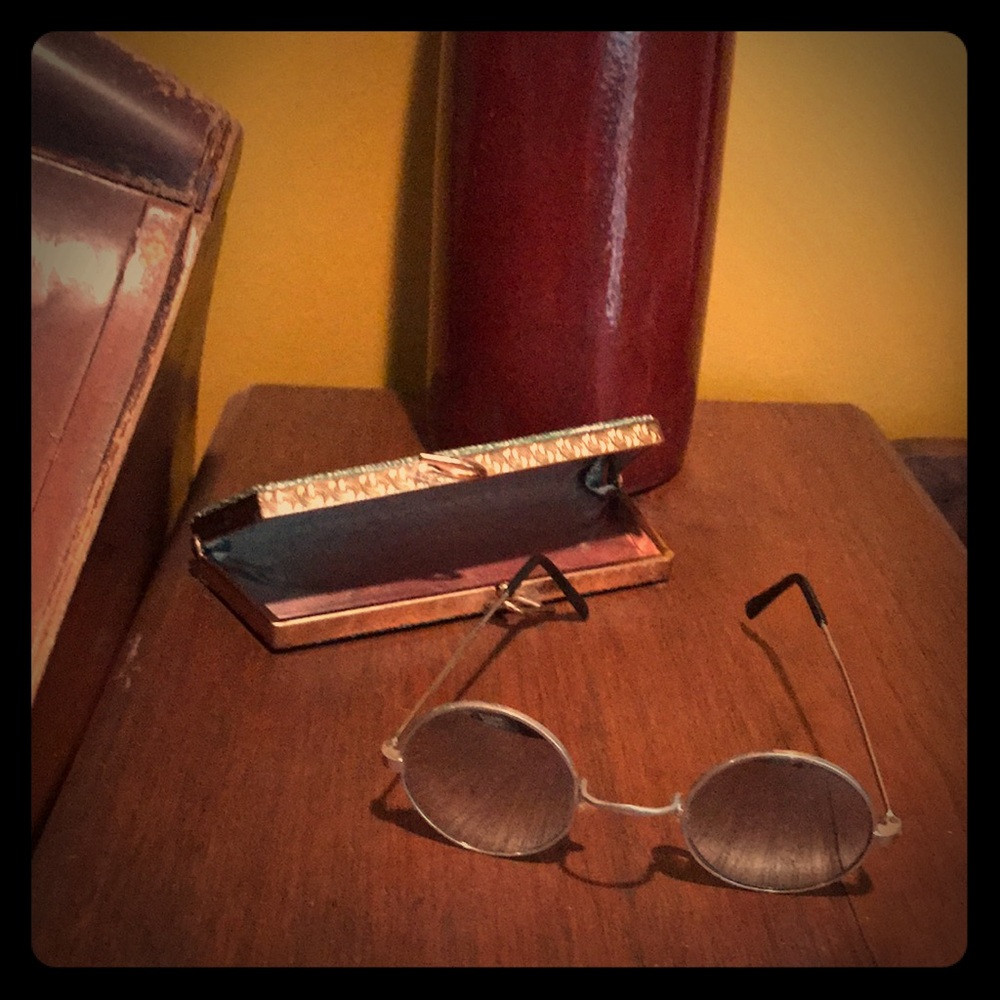 Vintage sunglasses with mid century modern case.